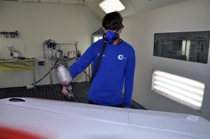 Student painting car