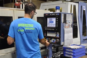 Student working with machine