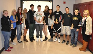 students standing by lockers