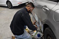 Student buffing car
