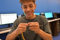 student making cable